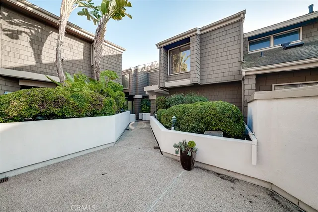 a view of a house with a window and garage