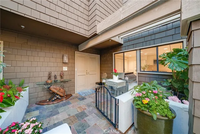 a view of a porch with furniture