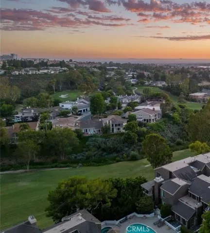 a view of a city with mountains in the background