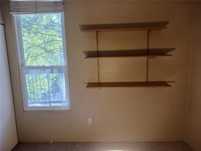 a view of a living room with gym equipment
