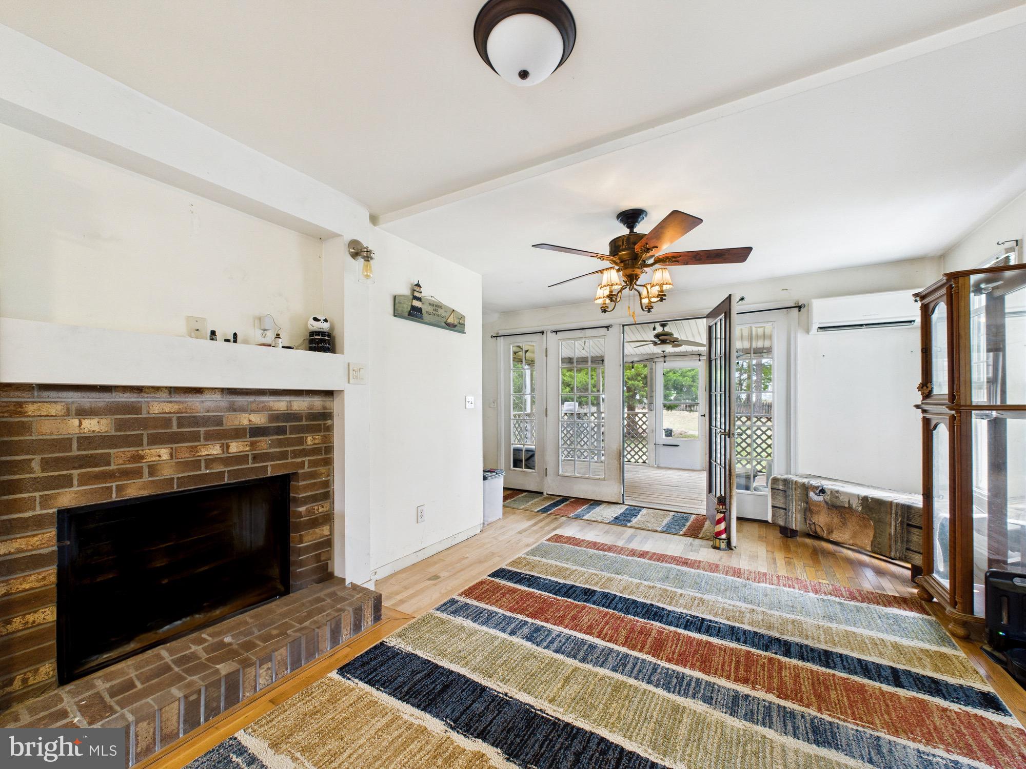 11161 Roland Parks Road Chance, MD 21821 - Photo 18 of 58 Dining room leading to back screened in porch