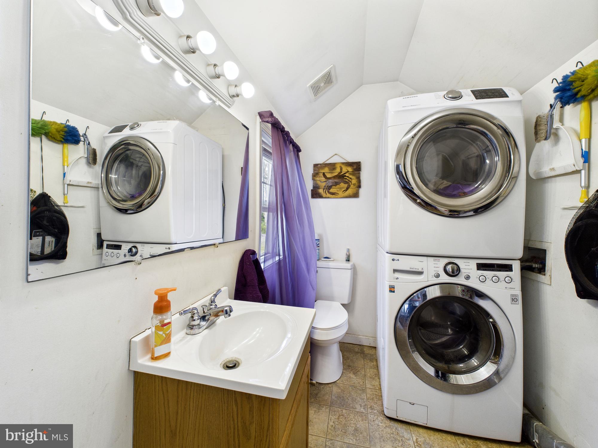 11161 Roland Parks Road Chance, MD 21821 - Photo 34 of 58 Half bathroom and laundry room