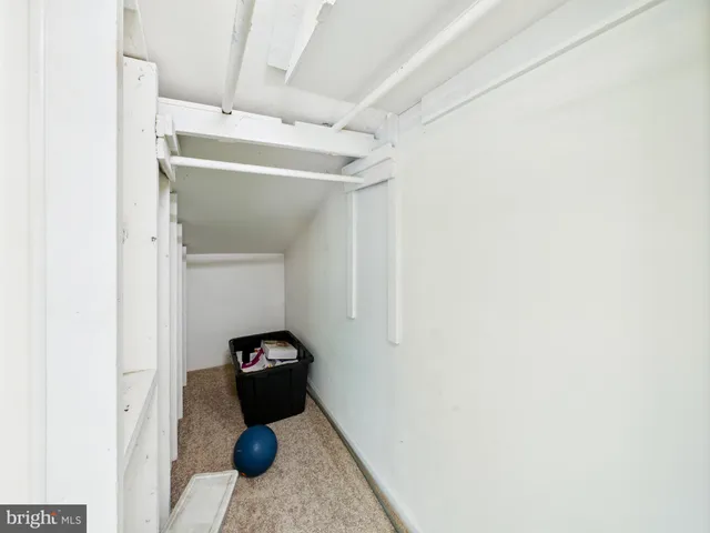 a view of a room with a large window