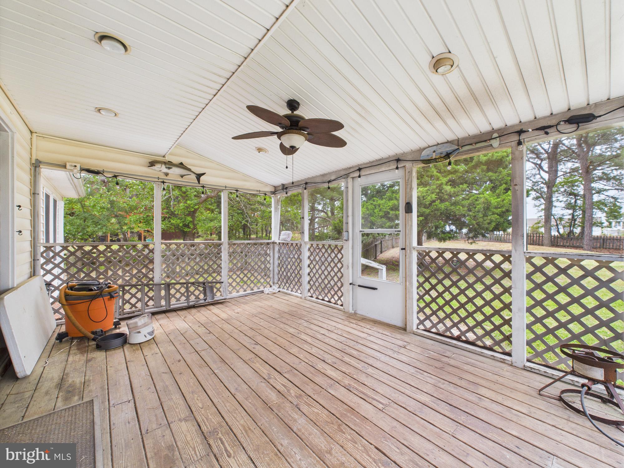 11161 Roland Parks Road Chance, MD 21821 - Photo 50 of 58 Side yard screened in porch