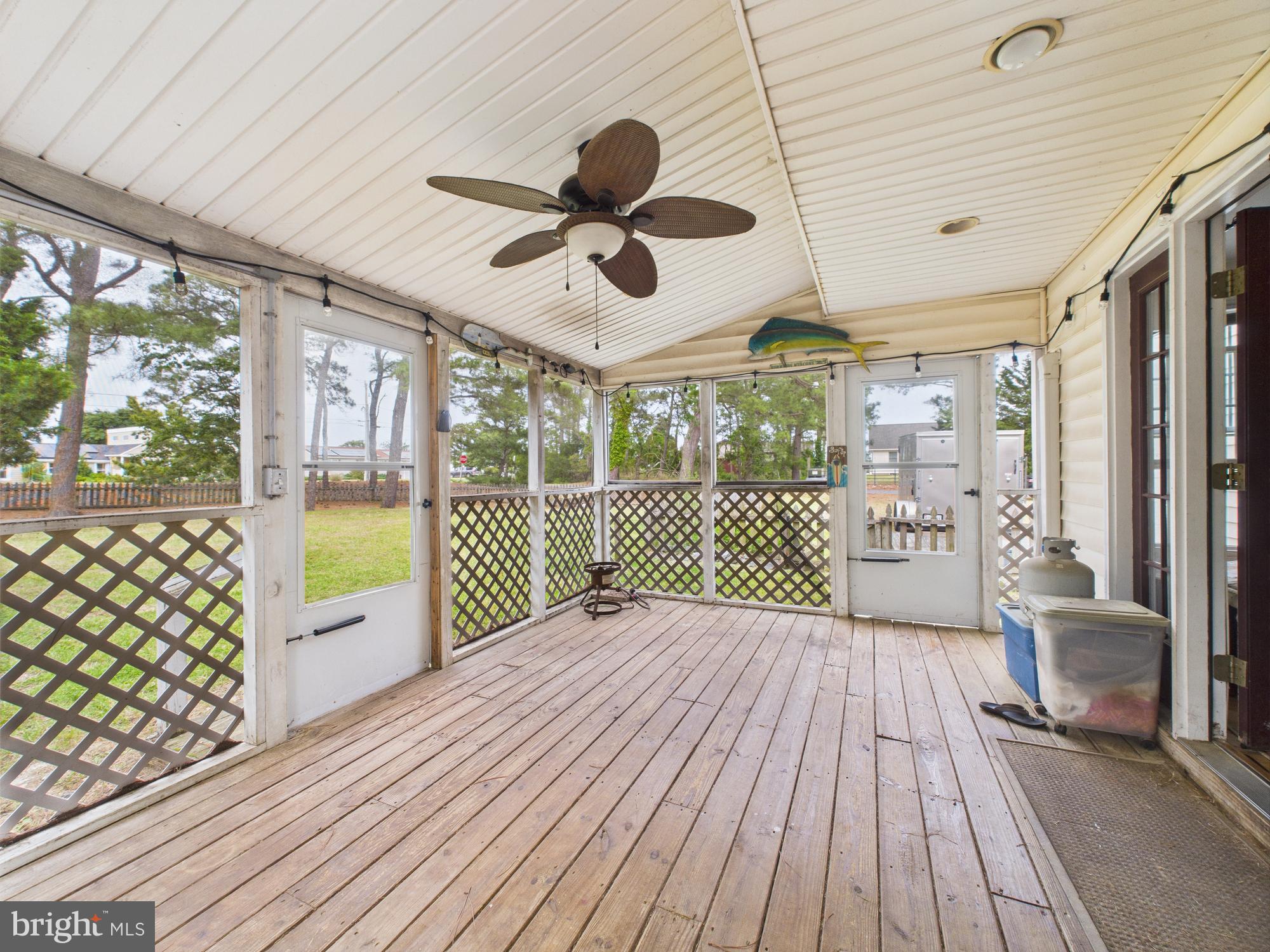 11161 Roland Parks Road Chance, MD 21821 - Photo 53 of 58 Side yard screened in porch