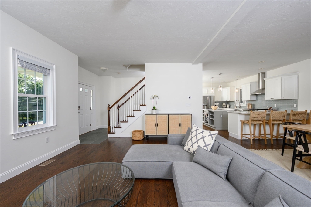 455 Broadway Hanover, MA 02339 - Photo 18 of 42 a living room with furniture and a table