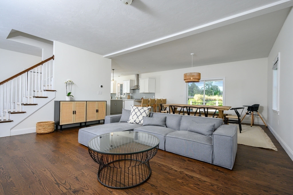 455 Broadway Hanover, MA 02339 - Photo 19 of 42 a living room with furniture and wooden floor