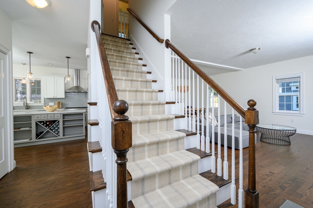 455 Broadway Hanover, MA 02339 - Photo 20 of 42 a view of entryway and hall with wooden floor