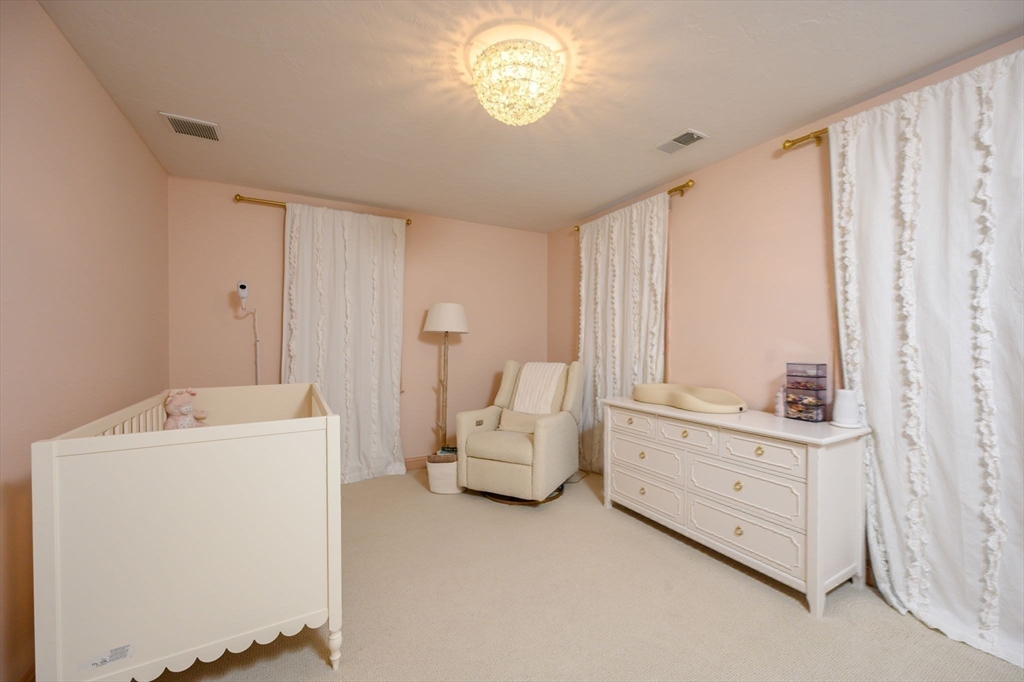 455 Broadway Hanover, MA 02339 - Photo 24 of 42 a living room with furniture and a window