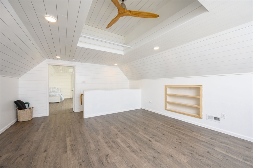 455 Broadway Hanover, MA 02339 - Photo 31 of 42 wooden floor in an empty room with a window