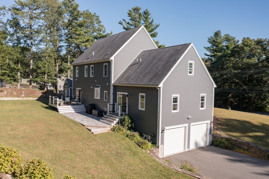 455 Broadway Hanover, MA 02339 - Photo 34 of 42 a view of a house with a yard