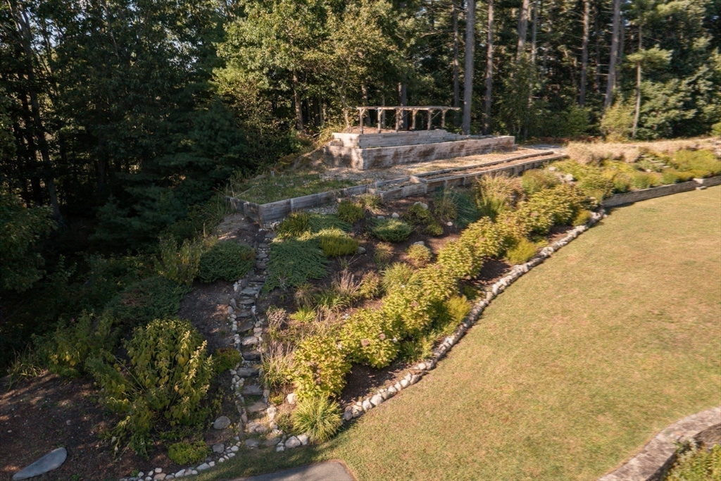 455 Broadway Hanover, MA 02339 - Photo 38 of 42 a view of a yard with plants
