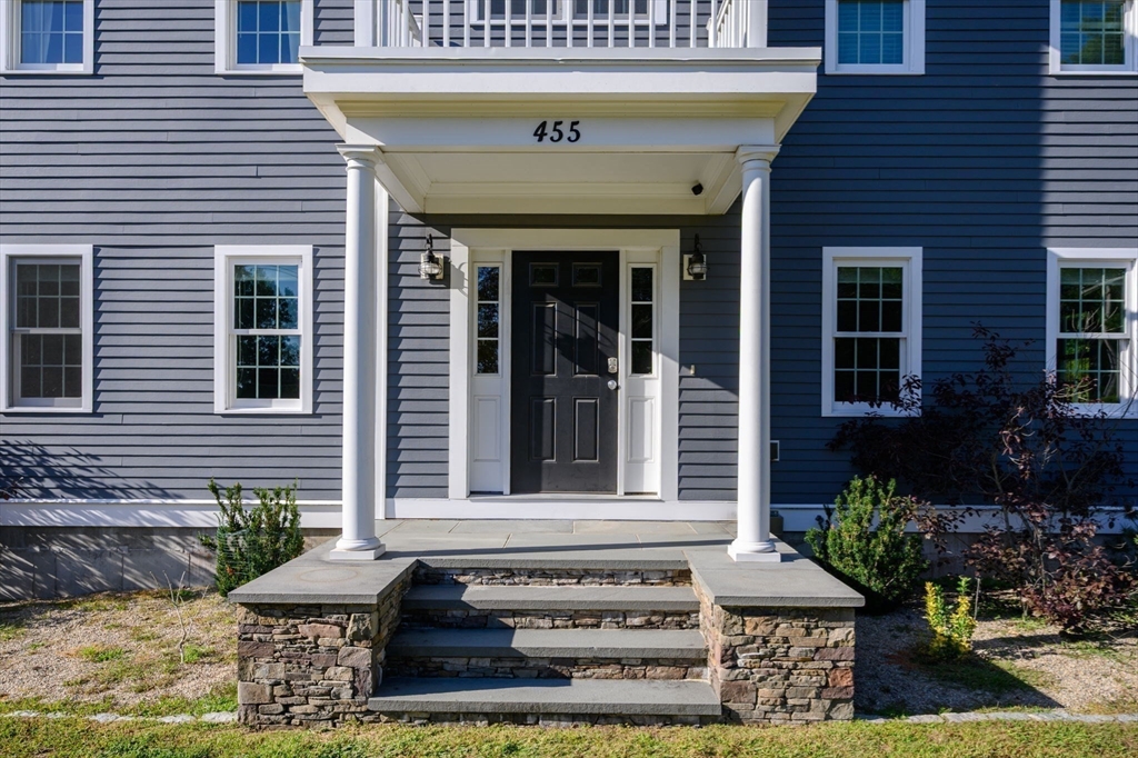 455 Broadway Hanover, MA 02339 - Photo 4 of 42 a front view of a house with garden