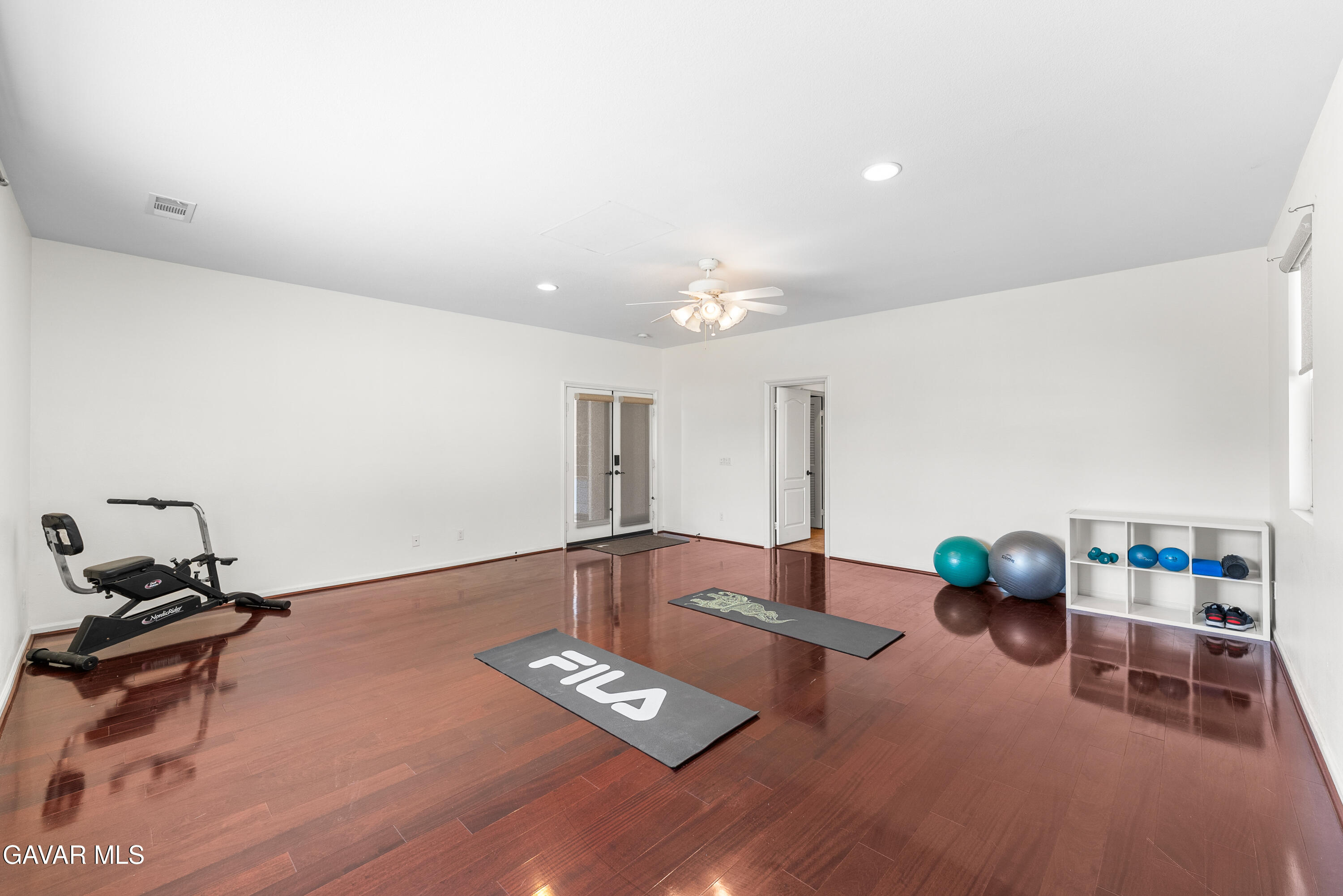 658 Lago Lindo Road Palmdale, CA 93550 - Photo 40 of 91 a living room with furniture and a wooden floor