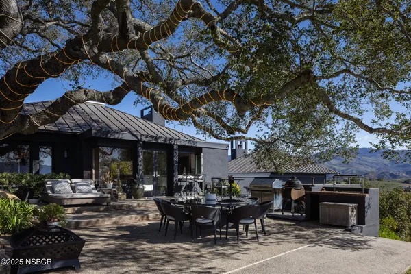 a view of a table and chairs in patio