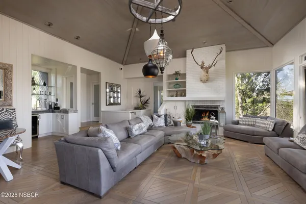 a view of a living room and bathroom