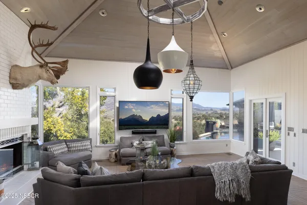 a room with furniture and a fireplace