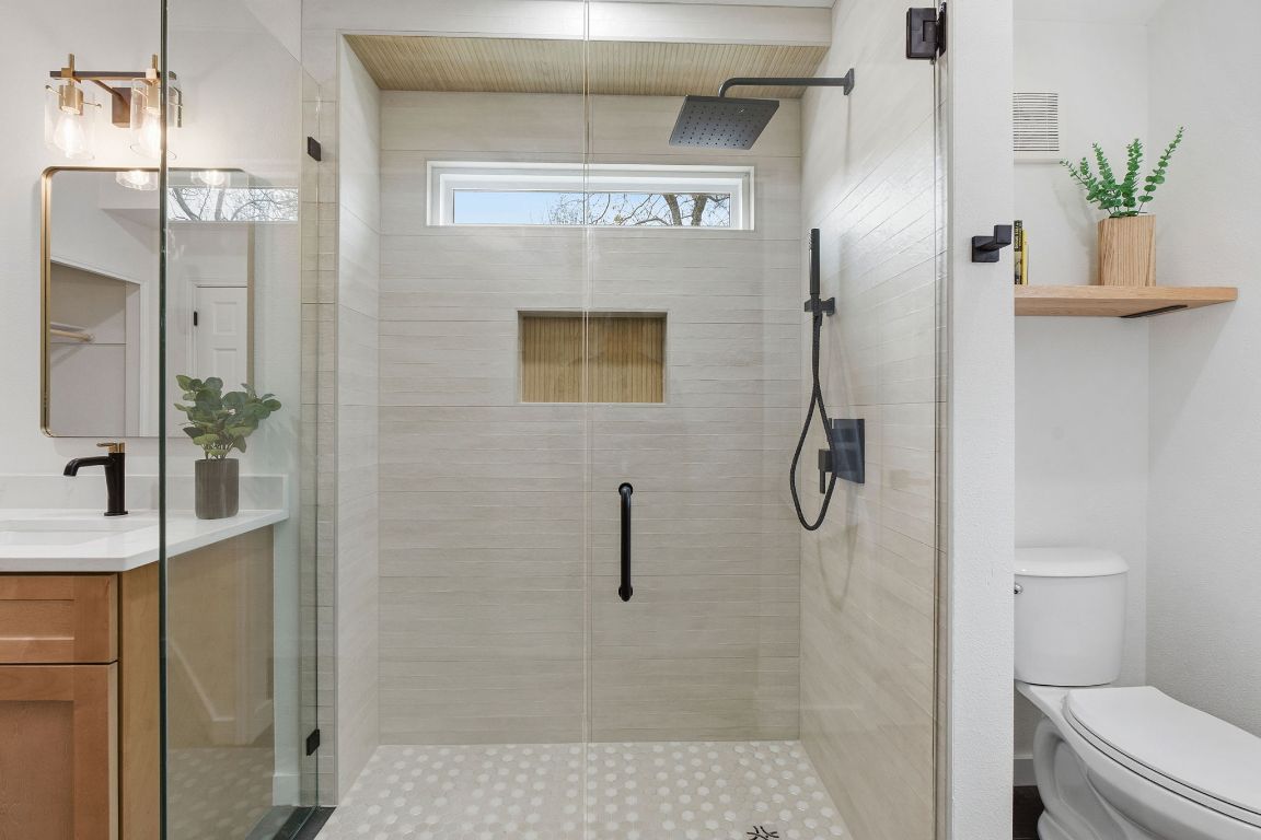 2701 Calabash Cove Austin, TX 78745 - Photo 26 of 40 a bathroom with a shower