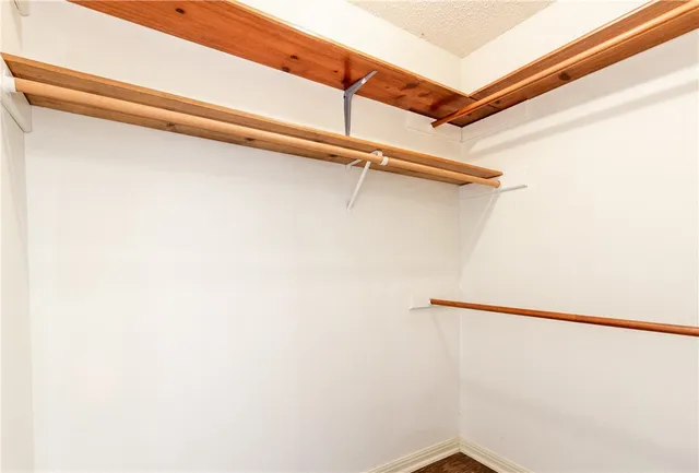 a view of a room with racks on the wall