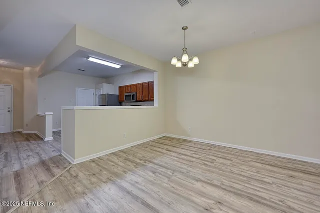 a view of a livingroom with chandelier