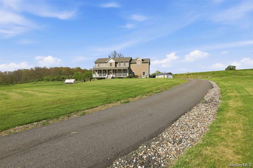 133 Old Chester Road Goshen, NY 10924 - Photo 4 of 33 a view of a stadium that has a big yard