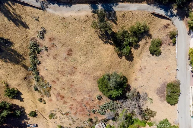a view of a yard covered with snow in outdoor space