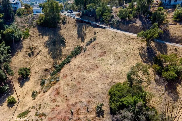 an aerial view of residential house with outdoor space