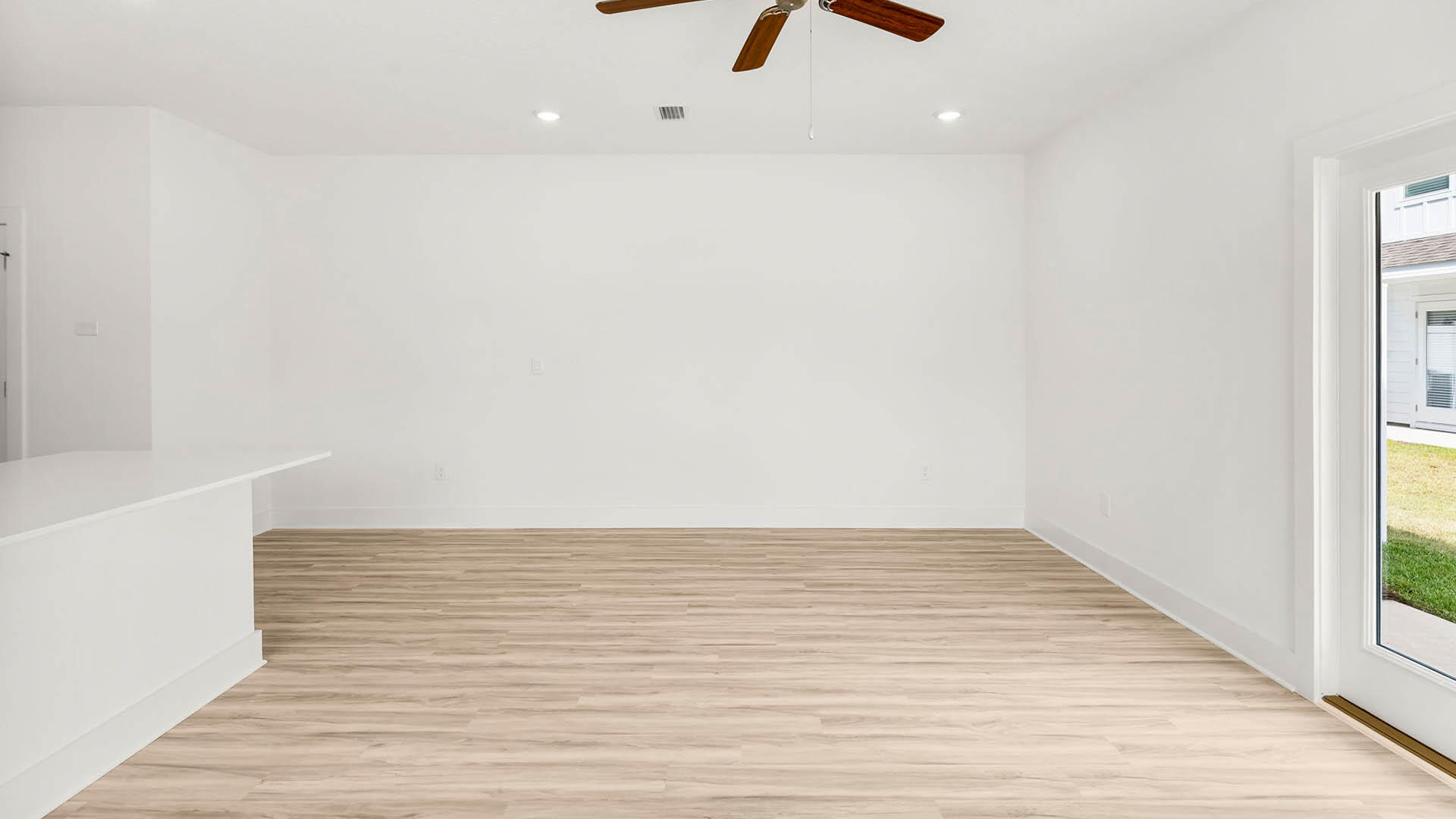 40 Hawk Street Santa Rosa Beach, FL 32459 - Photo 11 of 30 a view of an empty room with wooden floor and a window