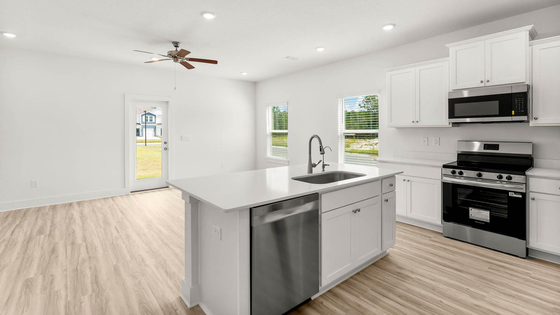 40 Hawk Street Santa Rosa Beach, FL 32459 - Photo 3 of 30 a kitchen with a sink a stove and cabinets
