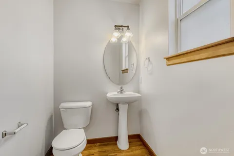 a bathroom with a toilet and a sink