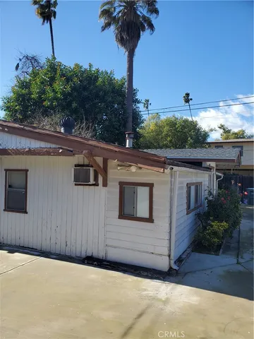 a front view of a house with yard and garage