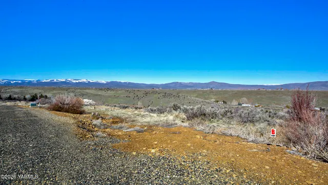 a view of mountain with lake view
