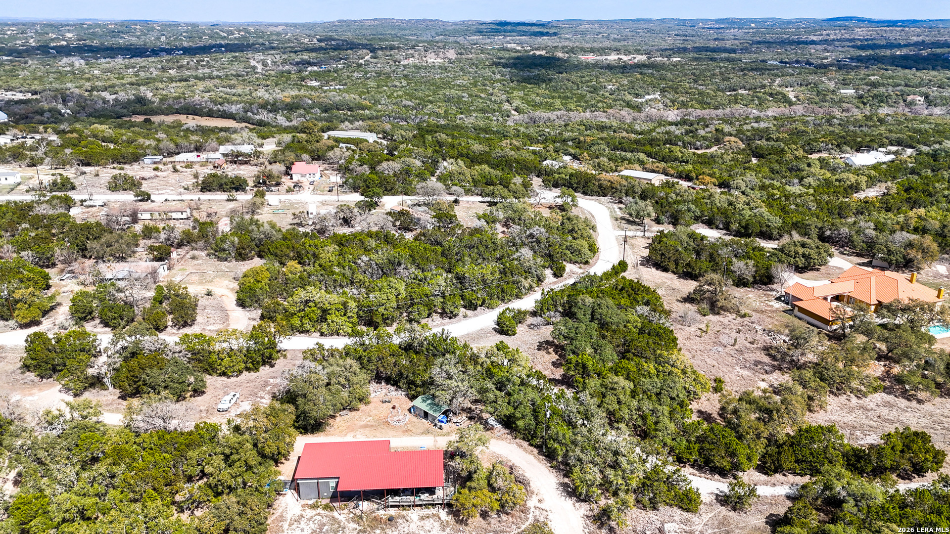2825 Rimrock Drive Spring Branch, TX 78070 - Photo 11 of 32 an aerial view of residential houses with outdoor space