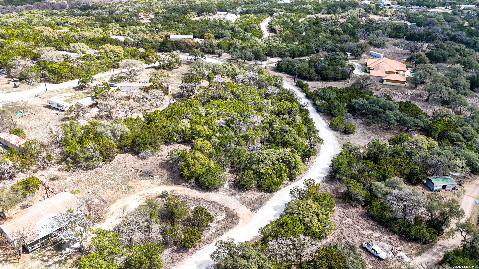 2825 Rimrock Drive Spring Branch, TX 78070 - Photo 17 of 32 a view of a forest with a house