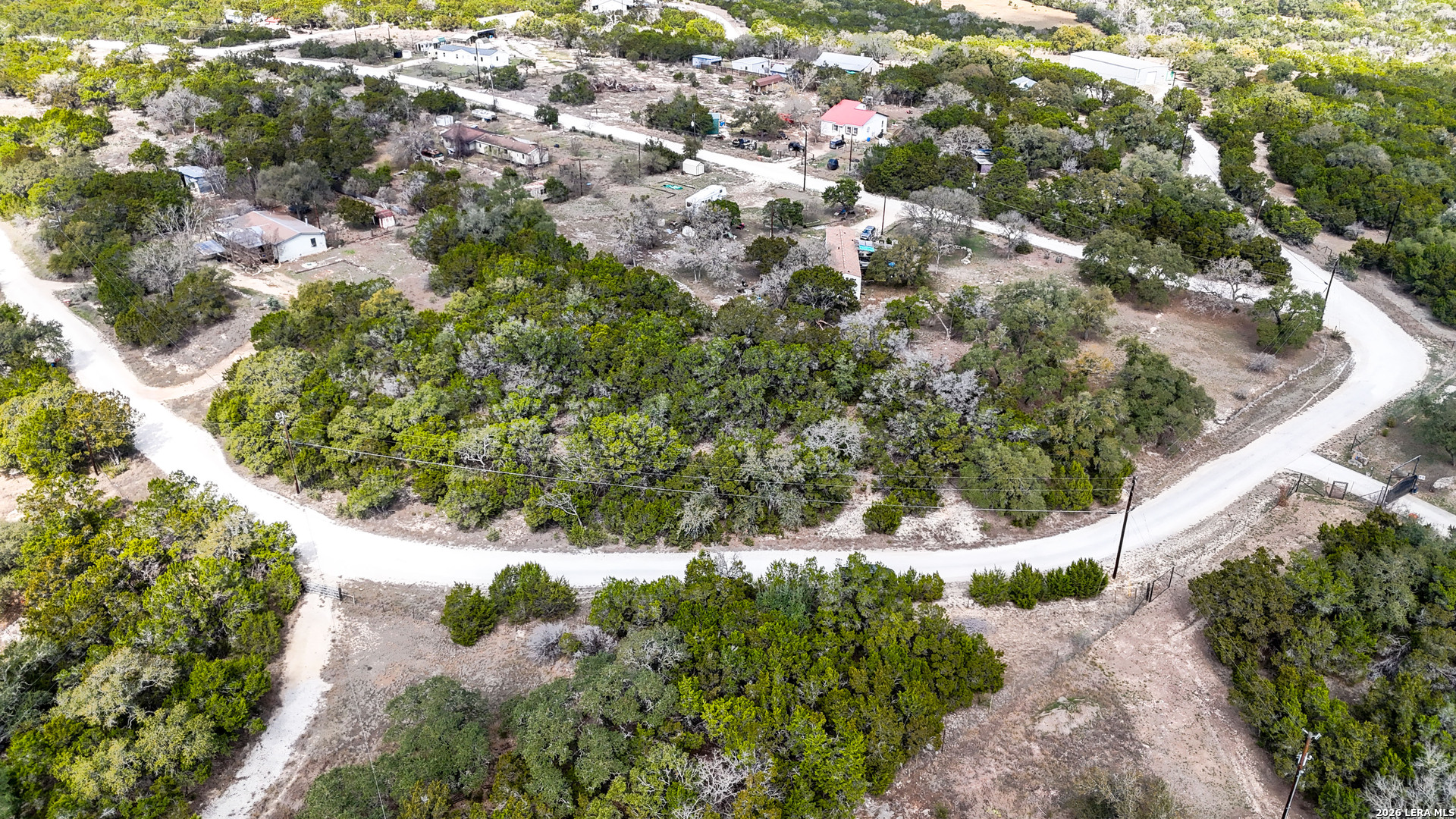 2825 Rimrock Drive Spring Branch, TX 78070 - Photo 18 of 32 a view of a garden with a tree