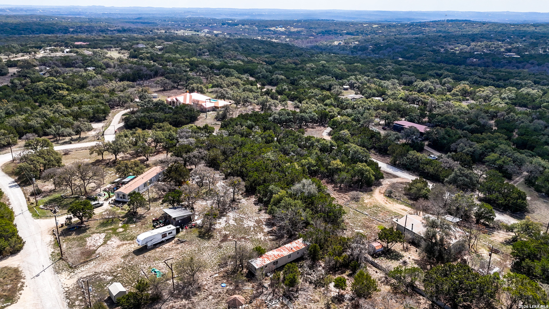 2825 Rimrock Drive Spring Branch, TX 78070 - Photo 21 of 32 an aerial view of a city and mountain view