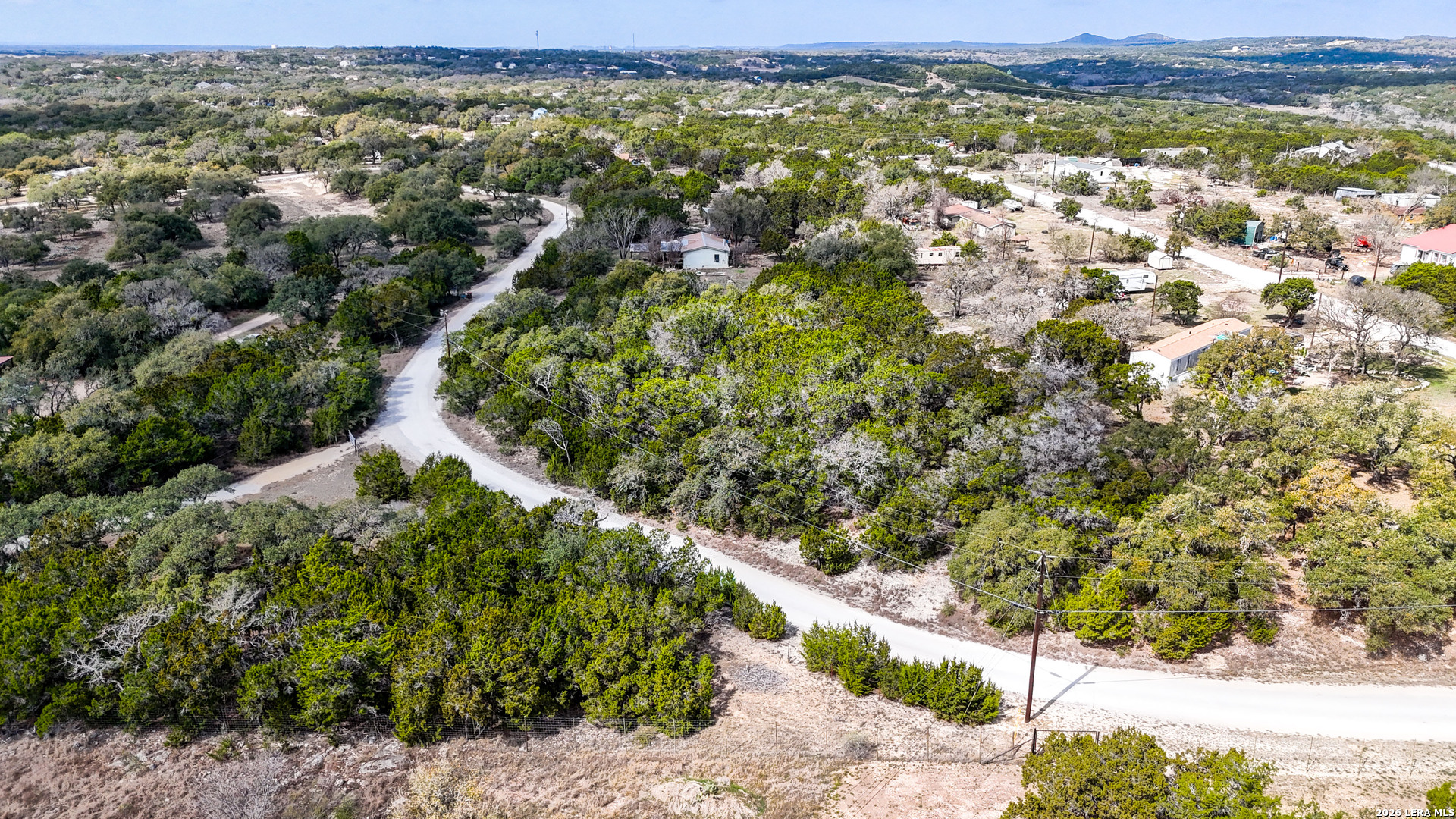 2825 Rimrock Drive Spring Branch, TX 78070 - Photo 27 of 32 a view of a city with green field
