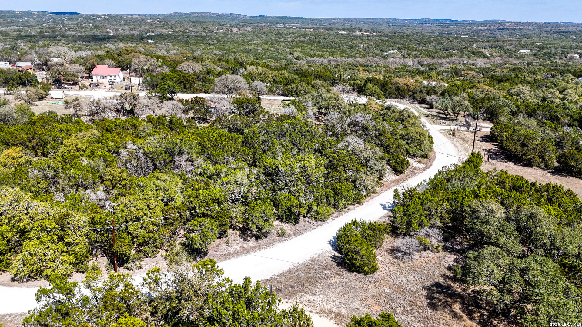 2825 Rimrock Drive Spring Branch, TX 78070 - Photo 3 of 32 a view of a lot of trees and houses
