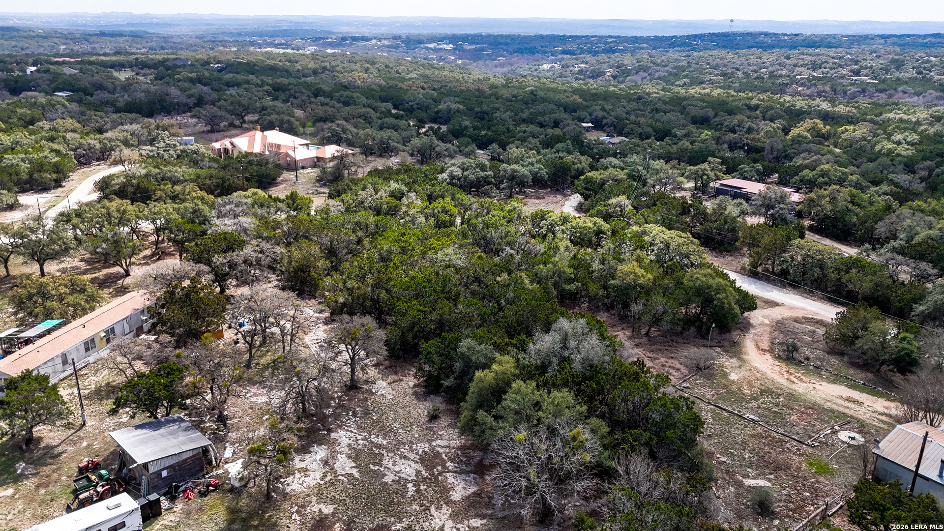 2825 Rimrock Drive Spring Branch, TX 78070 - Photo 32 of 32 an aerial view of a forest with houses