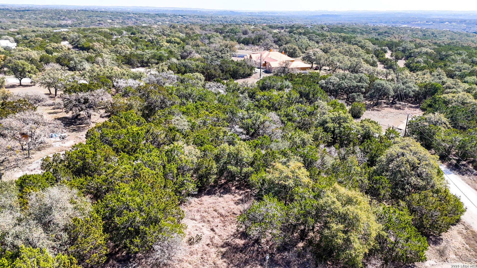 2825 Rimrock Drive Spring Branch, TX 78070 - Photo 4 of 32 an aerial view of residential house with outdoor space