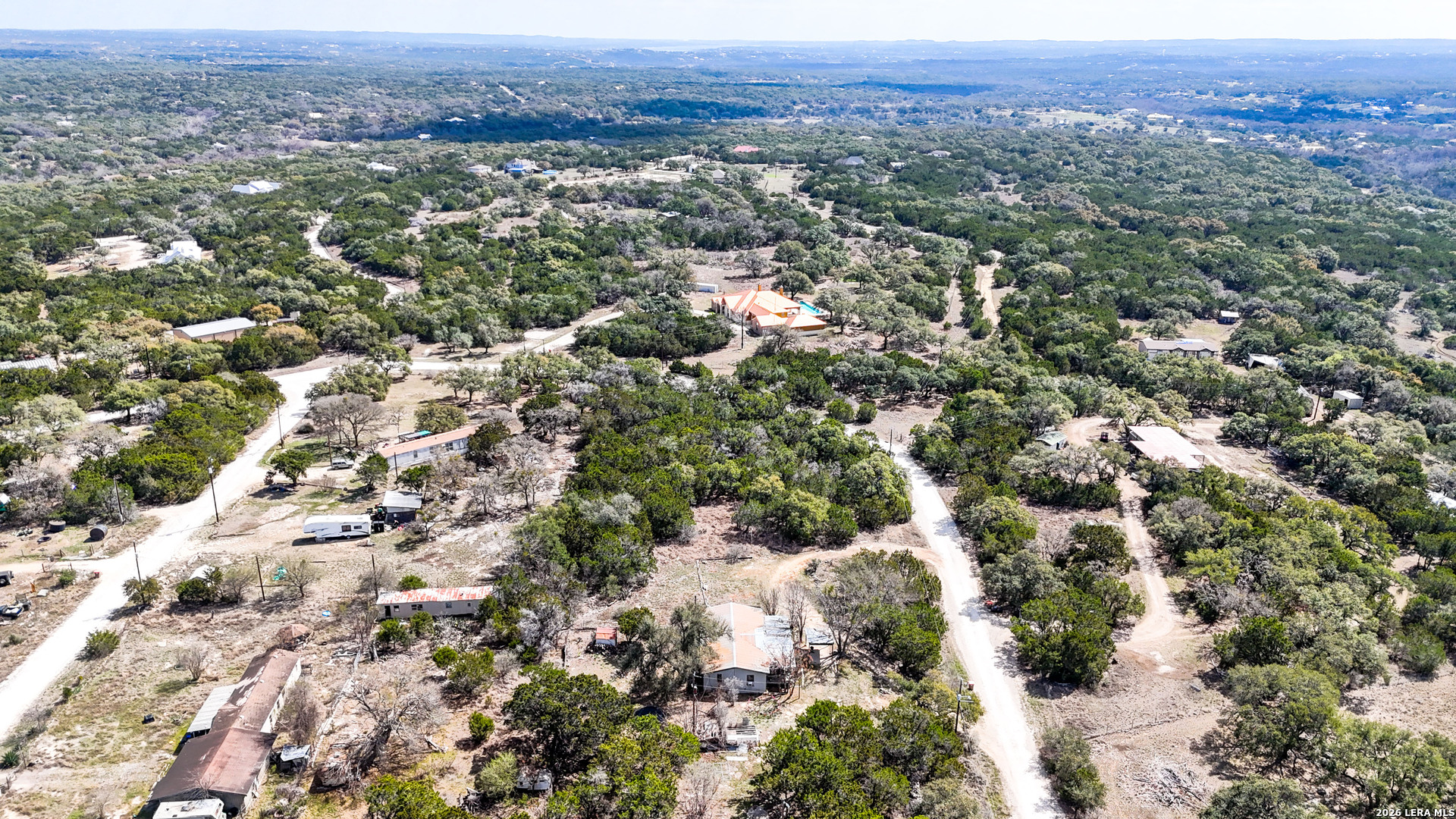 2825 Rimrock Drive Spring Branch, TX 78070 - Photo 9 of 32 an aerial view of residential house and green space