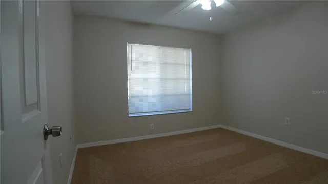 an empty room with a window