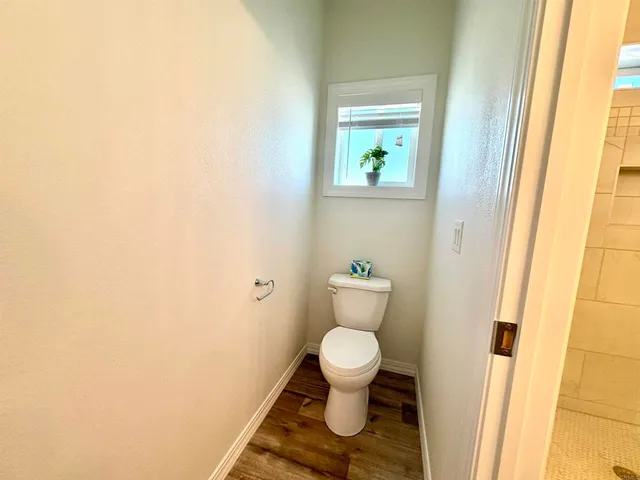 a bathroom with a toilet and a sink