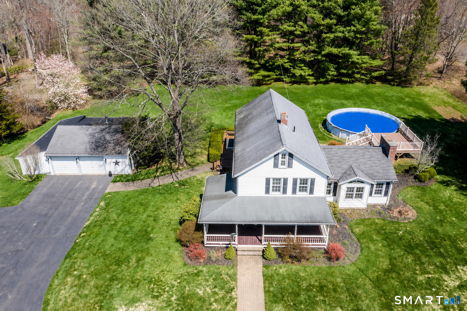From the wraparound porch to the expansive yard and virtually opened pool, this property is designed for making the most of summer at home.