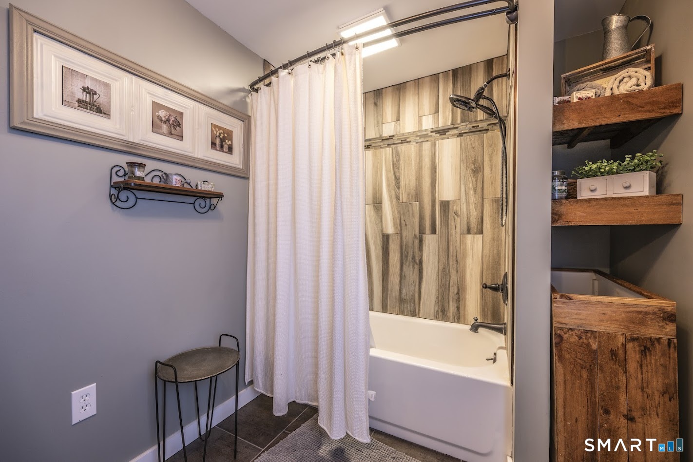 175 Howd Road Durham, CT 06422 - Photo 17 of 25 Beautifully remodeled full bath with stylish tilework, updated fixtures and rustic farmhouse charm.