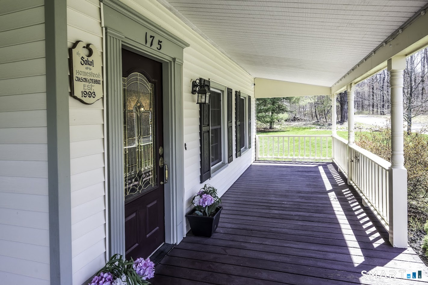 175 Howd Road Durham, CT 06422 - Photo 22 of 25 The wraparound porch offers the perfect place to relax with a morning coffee, greet guests, or unwind at the end of the day.