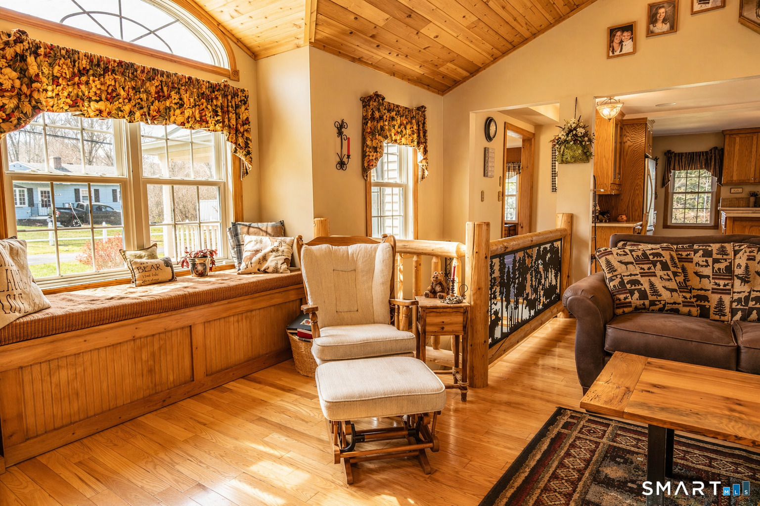 175 Howd Road Durham, CT 06422 - Photo 7 of 25 Custom banister details, pine ceilings and a built-in window seat add warmth, charm and one-of-a-kind character.