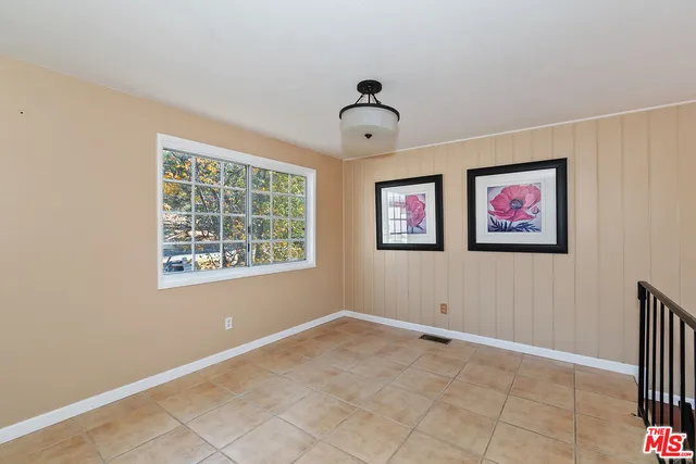 a kitchen with a stove and a refrigerator