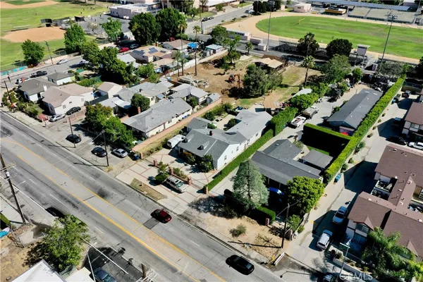 an aerial view of a house with a garden