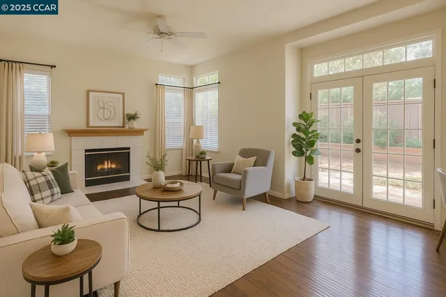 a living room with furniture and a fireplace